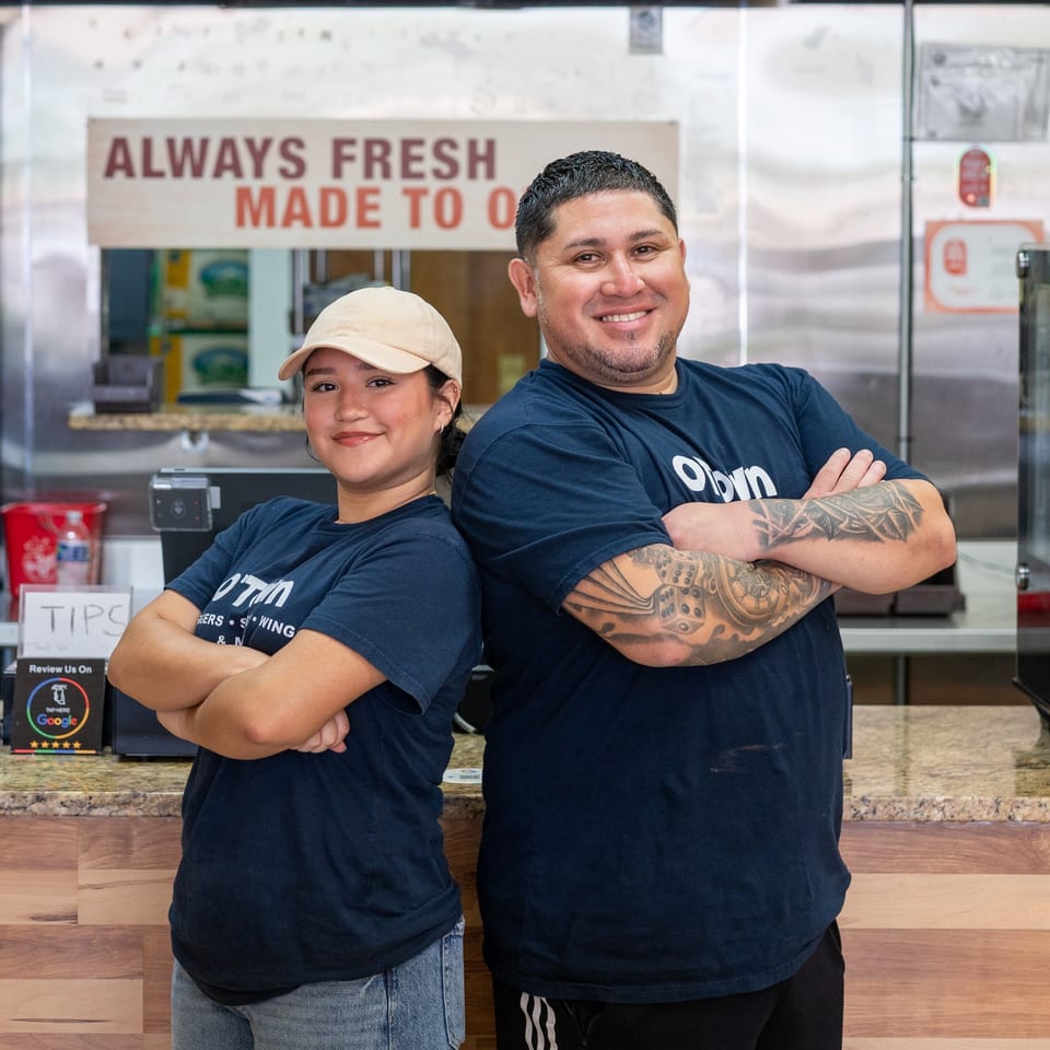 O'Town team at the counter